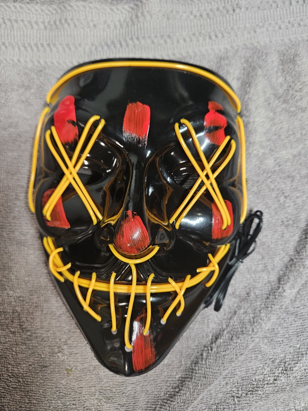 Black Battery Operated Halloween Skeleton Mask with Yellow Neon and Red Accents